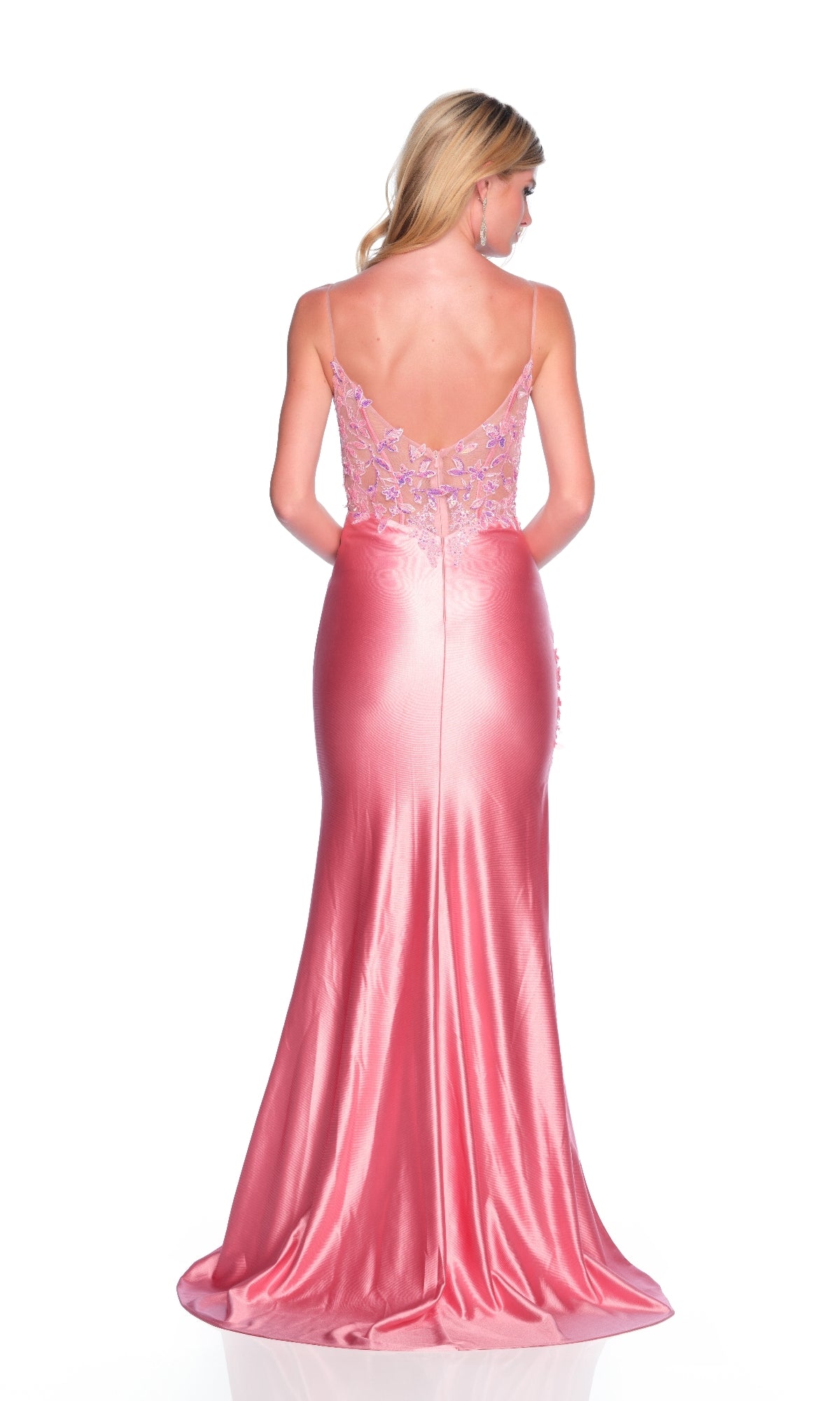 A woman faces away, wearing the Dave and Johnny 12200 long prom dress featuring a pastel pink satin floor-length skirt and a sheer corset bodice with delicate embroidery.